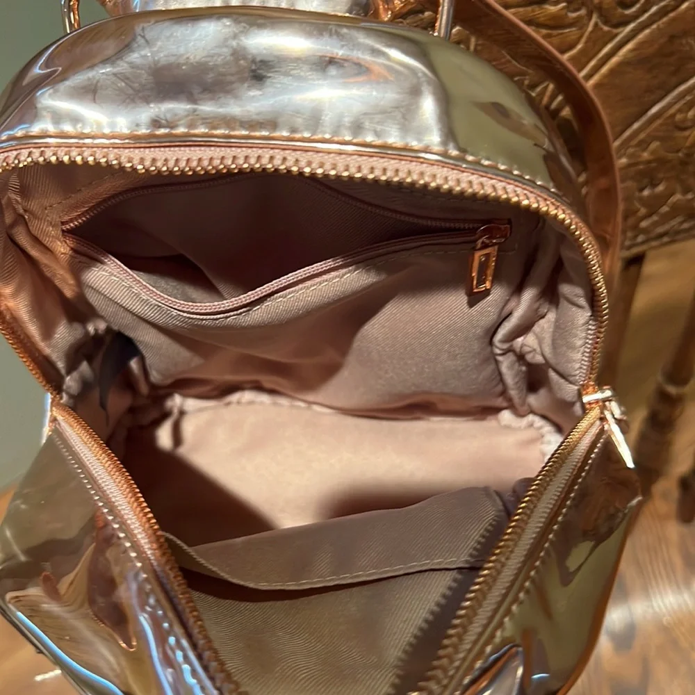 Guess Faux Leather Small  Backpack In A Shiny Rose Gold Colored